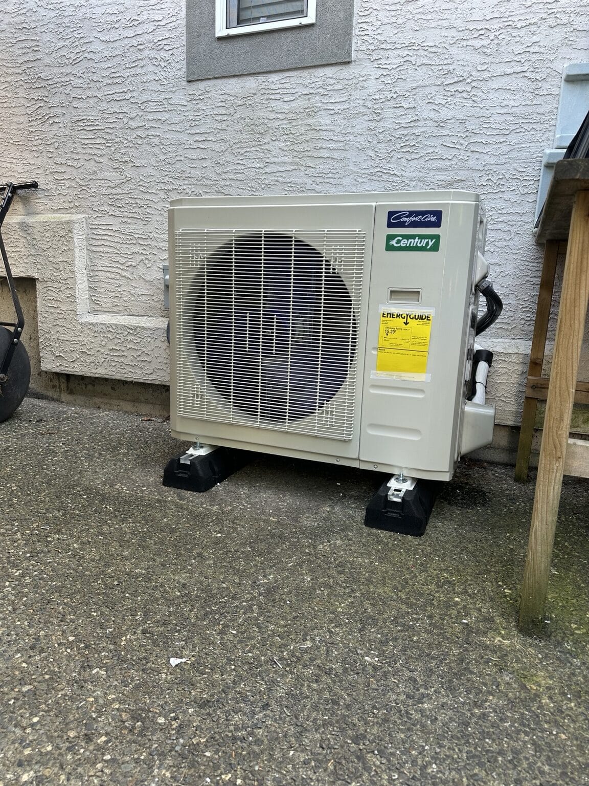 Carrier central heat pump outdoor unit installed by Perfect Choice HVAC