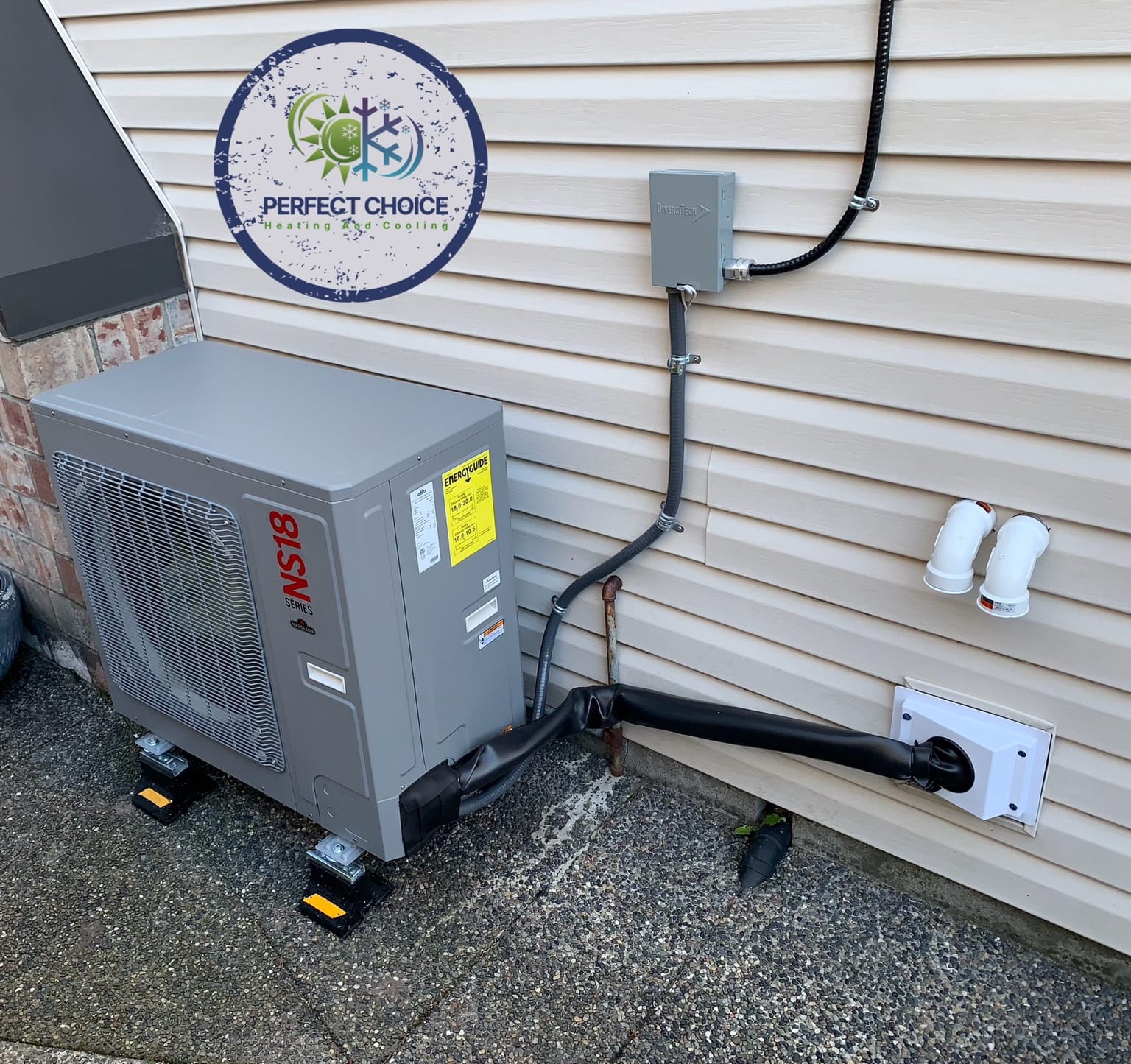Napoleon NS18 heat pump installed with protected refrigerant lines and disconnect by Perfect Choice HVAC