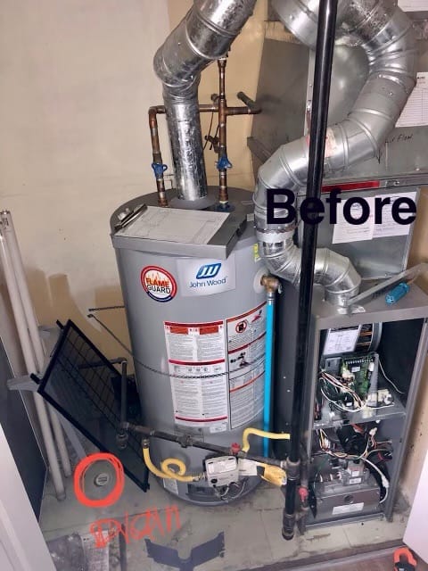Old gas storage water heater and furnace before replacement