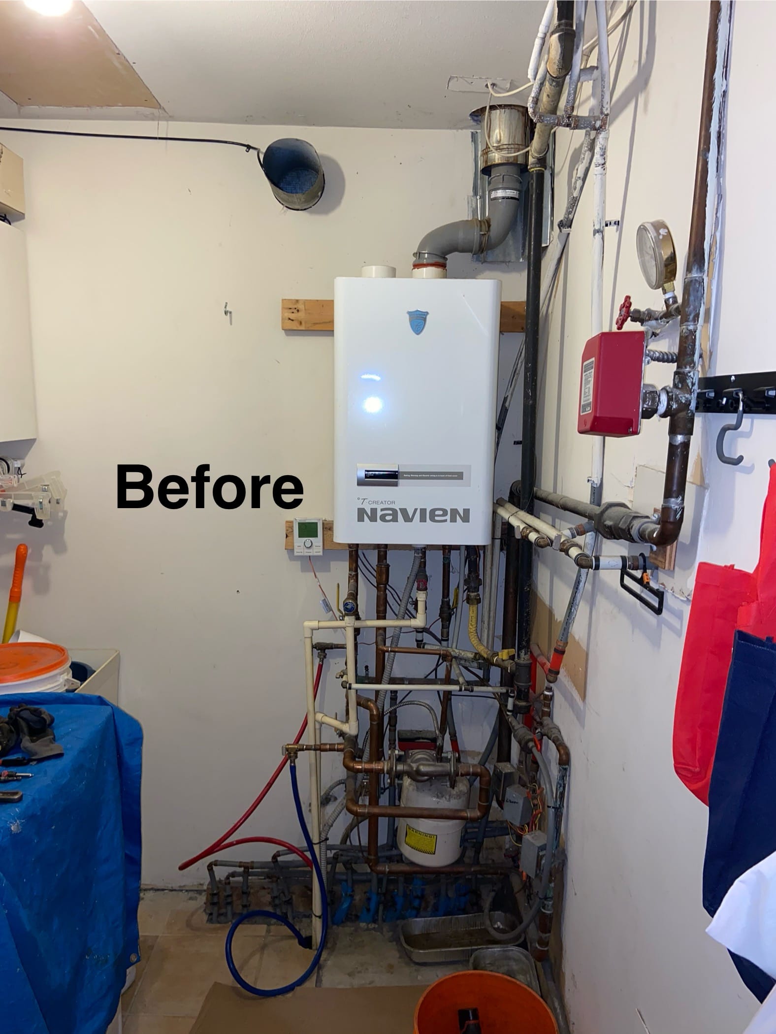 HVAC before and after projects showing an old Navien hydronic boiler before replacement in Metro Vancouver