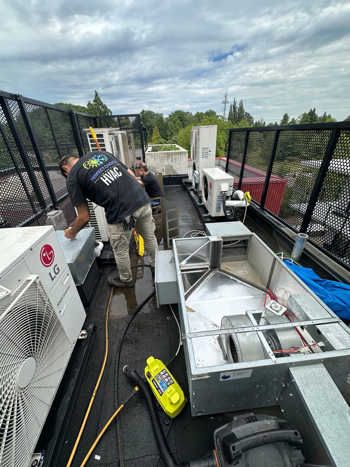 Perfect Choice HVAC technicians servicing commercial rooftop equipment in Metro Vancouver