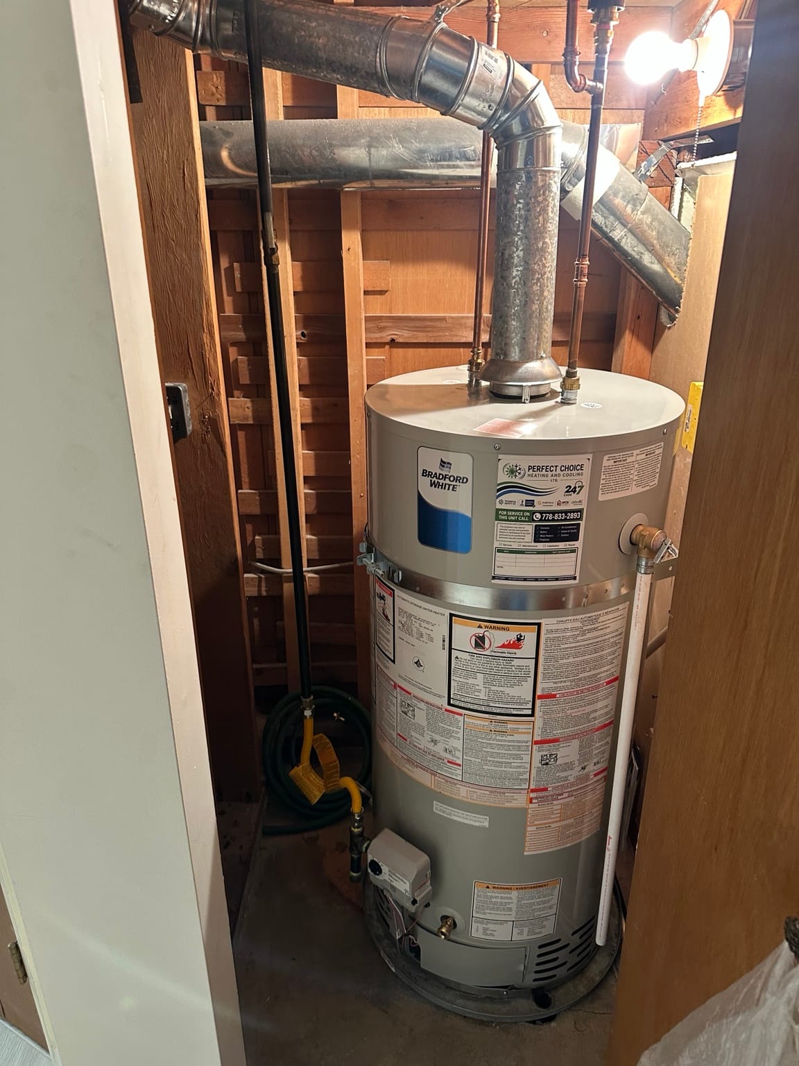 Close-up of completed Bradford White gas water heater installation by Perfect Choice Heating and Cooling
