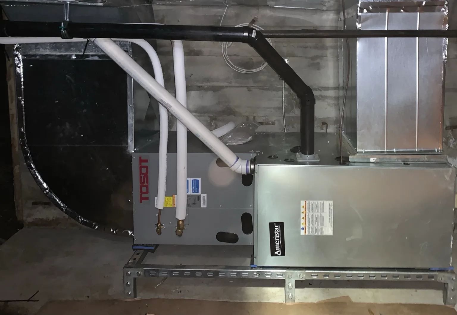 TOSOT heat pump coil paired with a compatible gas furnace in a dual-fuel installation in Metro Vancouver
