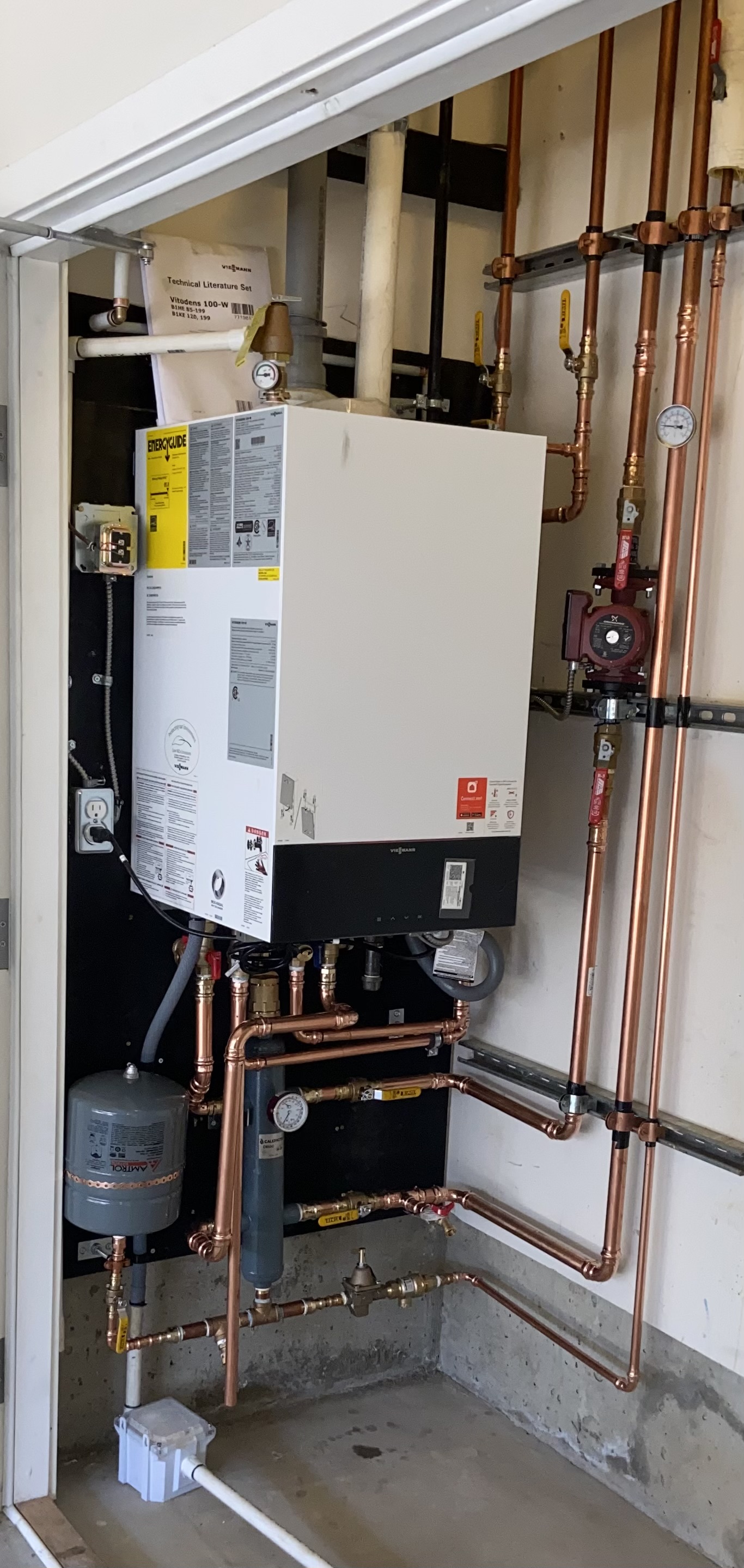 Viessmann Vitodens 100-W boiler with copper hydronic piping installed by Perfect Choice HVAC
